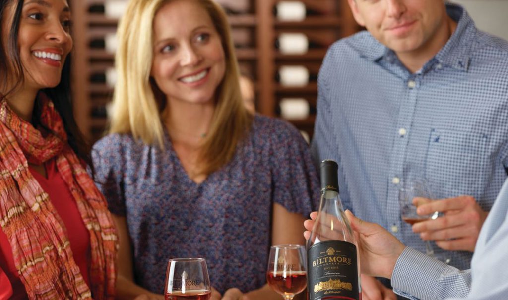 Guests enjoying a wine tasting at Biltmore Winery